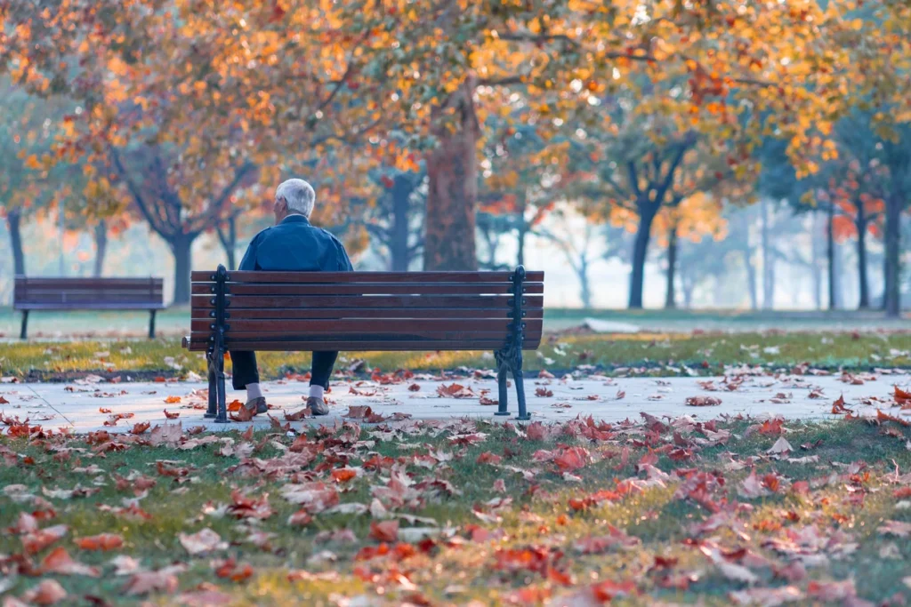 man sitting on bench