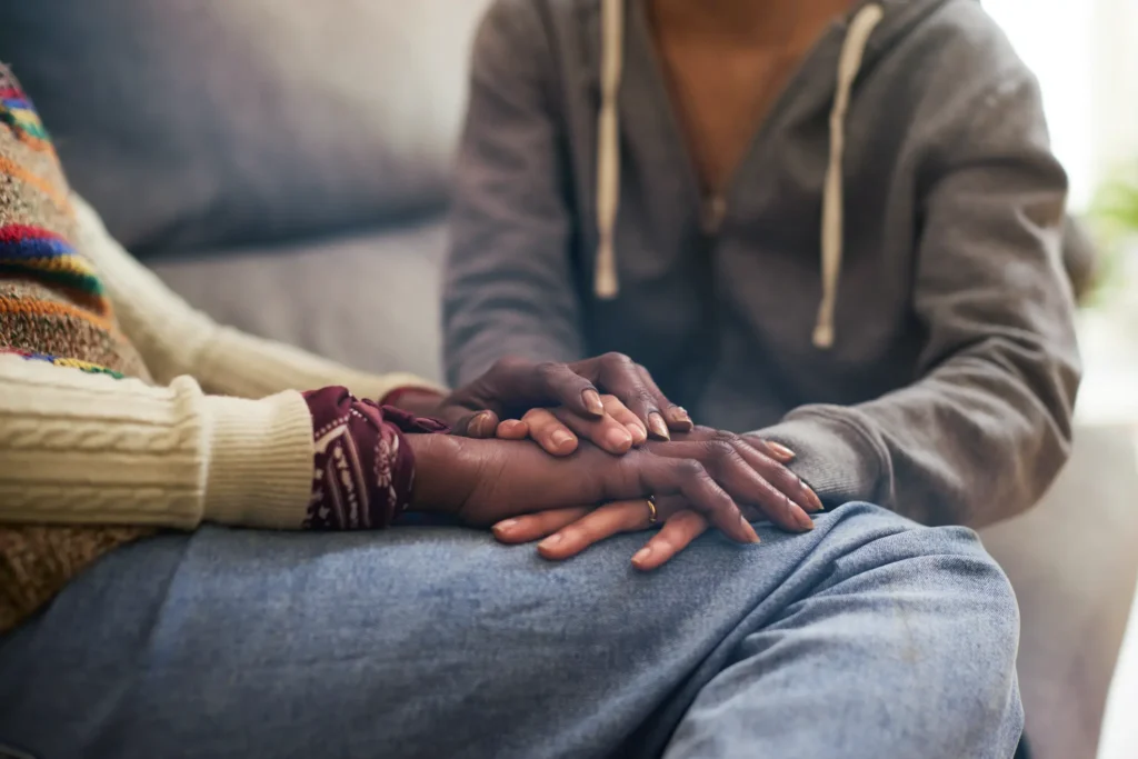mother and daughter holding hands