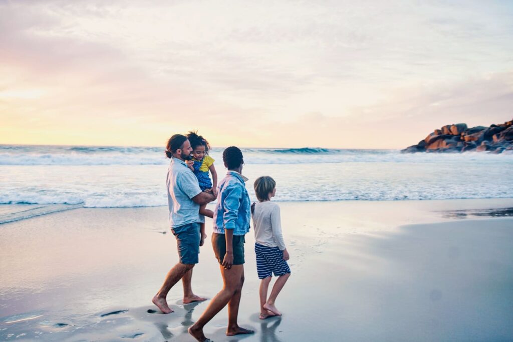 family walking on beach